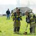 Firefighters strap on their gear during a training exercise and controlled burn in 6700 block of Warner Rd. in Pittsfield Township on Thursday, May 9, 2013. Melanie Maxwell I AnnArbor.com